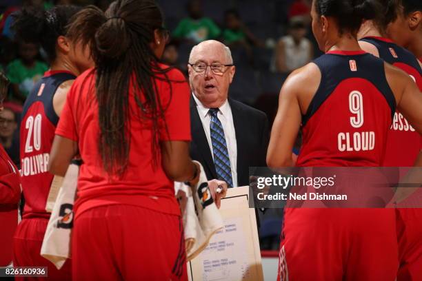 Mike Thibault of the Washington Mystics talks with his team during the game against the Atlanta Dream on July 19, 2017 at the Verizon Center in...