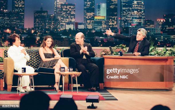 Pictured: Actors Jackie Chan, Michael Michele, and Larry Miller during an interview with host Jay Leno on March 29, 1999 --
