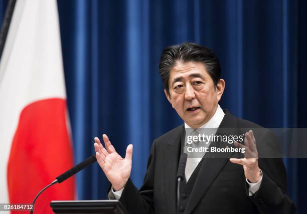 Shinzo Abe, Japan's prime minister, gestures while speaking during a news conference in Tokyo, Japan, on Thursday, Aug. 3, 2017. Abe reshuffled his...