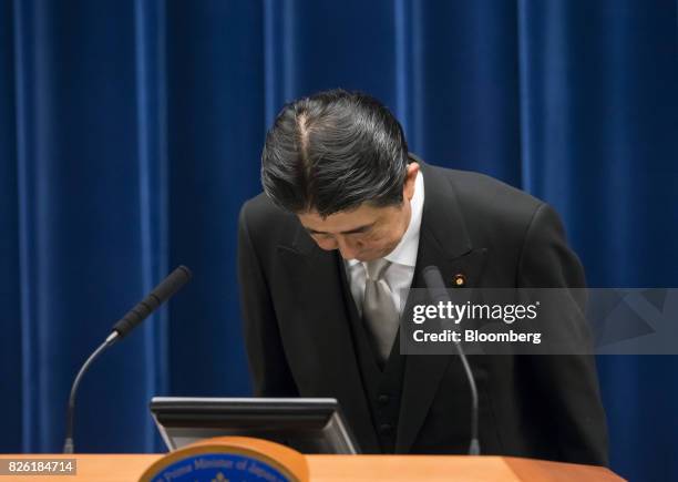 Shinzo Abe, Japan's prime minister, bows during a news conference in Tokyo, Japan, on Thursday, Aug. 3, 2017. Abe reshuffled his ministers and party...