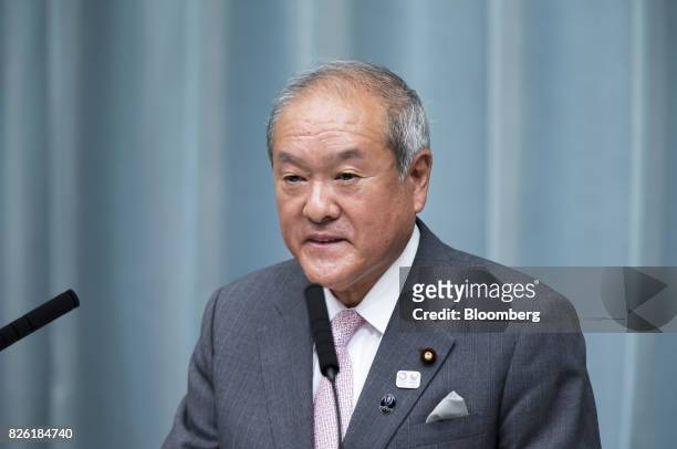 Shunichi Suzuki, newly-appointed Tokyo Olympic and Paralympic Games minister of Japan, speaks during a news conference at the Prime Minister's...