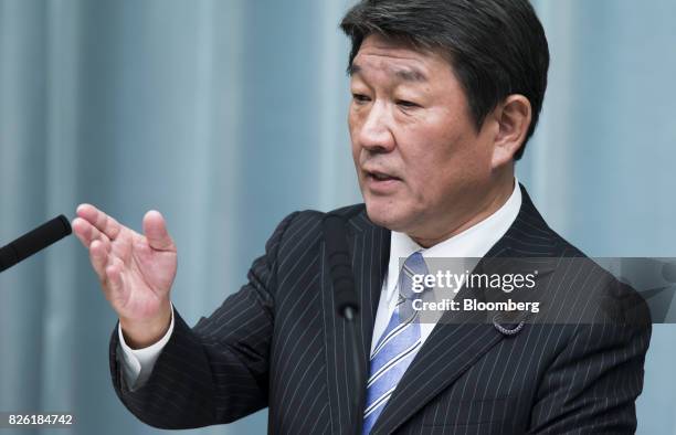 Toshimitsu Motegi, newly-appointed economic revitalization minister of Japan, speaks during a news conference at the Prime Minister's official...