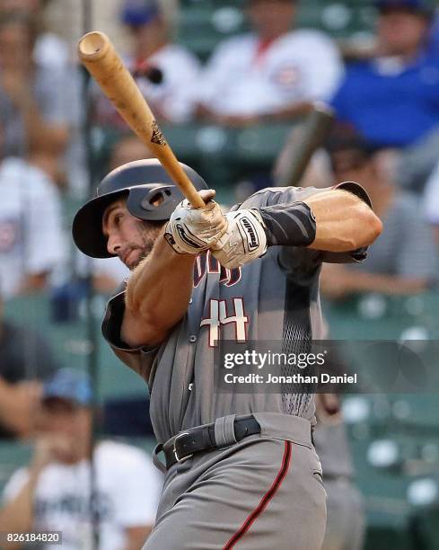 Paul Goldschmidt of the Arizona Diamondbacks hits his third home run of the game, a solo shot in the 9th inning, against the Chicago Cubs at Wrigley...