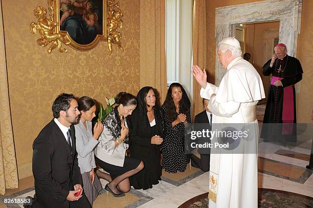 Pope Benedict XVI delivers his blessing to Ingrid Betancourt and her relatives during a meeting at pope's summer residence, on September 1, 2008 in...