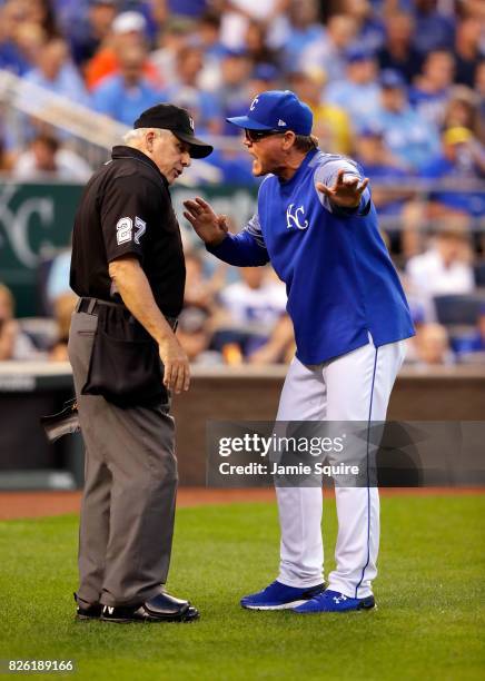 Manager Ned Yost of the Kansas City Royals argues with home plate umpire Larry Vanover before being ejected during the 4th inning of the game against...