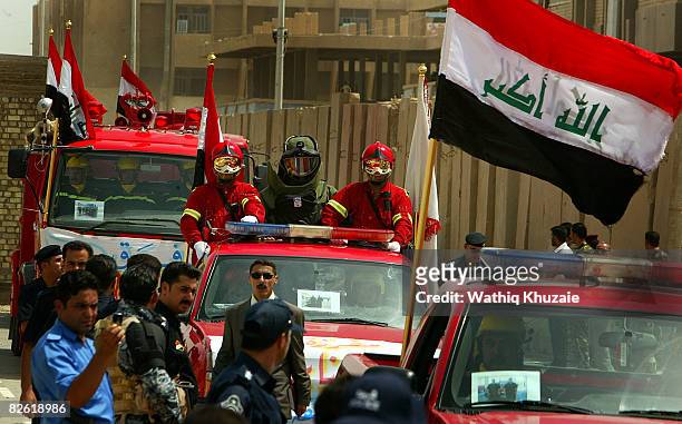 Iraqi security forces parade during a handover ceremony at the government headquarters September 1, 2008 in Ramadi, the capital of Anbar province,...