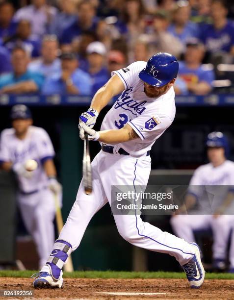 Brandon Moss of the Kansas City Royals hits a two-run home run during the 5th inning of the game against the Seattle Mariners at Kauffman Stadium on...