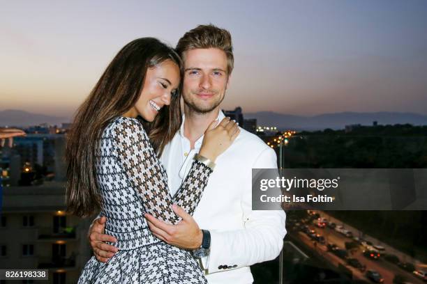 German actor Joern Schloenvoigt and his girlfriend Hanna Weig attend the Remus Lifestyle Night on August 3, 2017 in Palma de Mallorca, Spain.