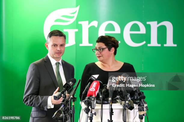 James Shaw speaks while Metiria Turei looks on during a press conference on August 4, 2017 in Wellington, New Zealand. The Green Party co-leader came...