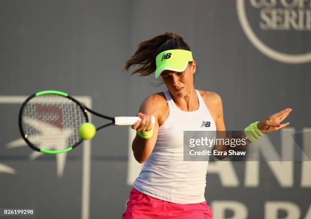 Nicole Gibbs returns a shot to CoCo Vandeweghe during Day 4 of the Bank of the West Classic at Stanford University Taube Family Tennis Stadium on...