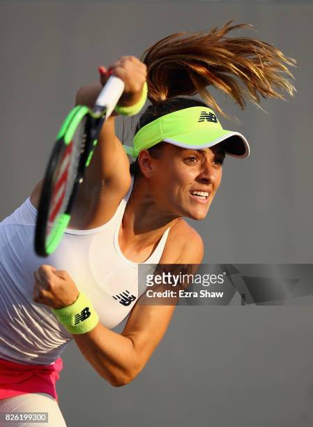 Nicole Gibbs serves to CoCo Vandeweghe during Day 4 of the Bank of the West Classic at Stanford University Taube Family Tennis Stadium on August 3,...