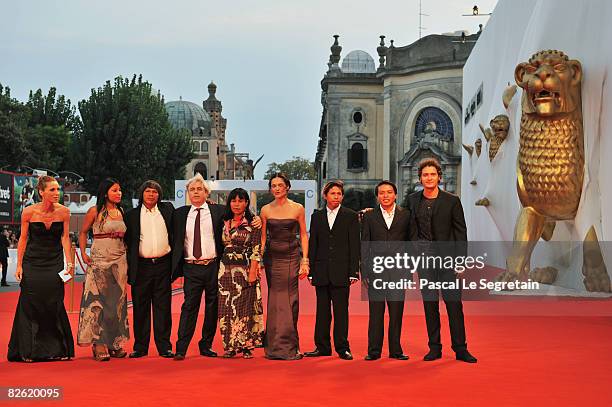 Marco Bechis , Chiara Caselli and Claudio Santamaria attend the 'Birdwatchers - La Terra Degli Uomini Rossi' film premiere at the Sala Grande during...