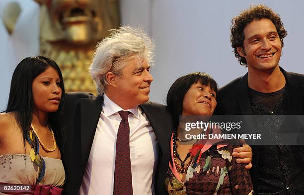 Actors Eliane Juca da Silva, Italy's director Marco Bechis, actors Alic?lia Batista Cabreira and Claudio Santamaria pose before the screening of the...