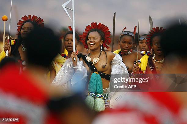 The princess of Swaziland dances in front of King Mswati III and his delegates during an annual traditional reed dance at Ludzidzini palace outside...