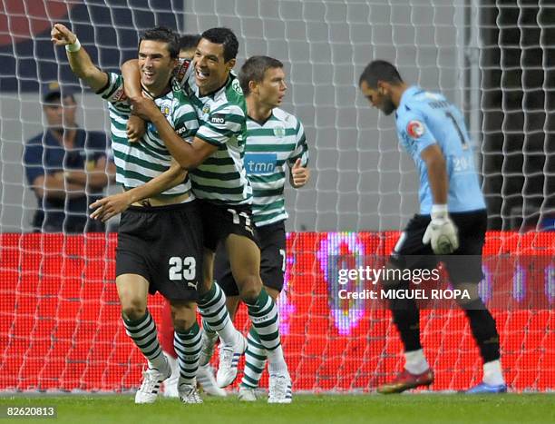 Sporting CP's Helder Postiga celebrates with teammate Vanderlei Silva "Derlei" after scoring against SC Braga during their Portuguese First League...