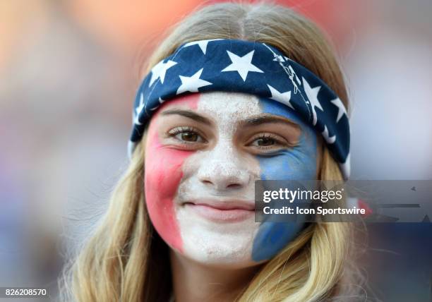 Young USA fan with her face painted gets into the spirit of the game during the Tournament of Nations soccer match between USA and Japan on August...