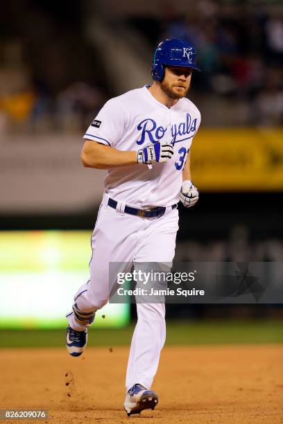 Brandon Moss of the Kansas City Royals rounds the bases after hitting a home run during the 8th inning of the game against the Seattle Mariners at...