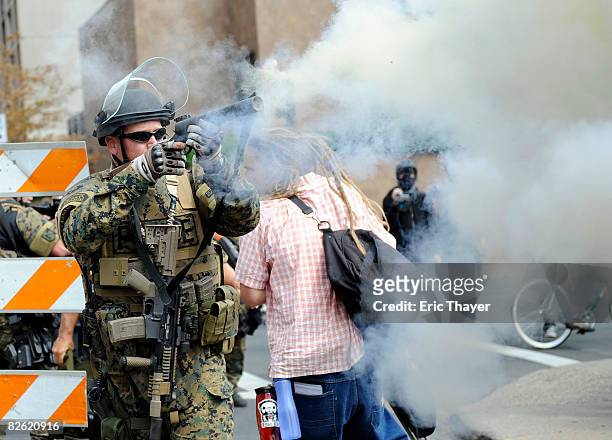 Police fire tear gas as protesters attempt to disrupt the 2008 Republican National Convention near the site at the Xcel Energy Center September 1,...