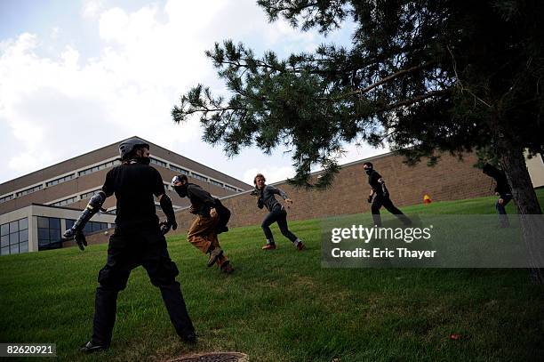 Protesters attempt to disrupt the 2008 Republican National Convention near the site at the Xcel Energy Center September 1, 2008 in Minneapolis,...