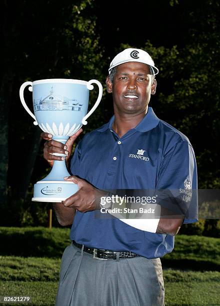 Vijay Singh holds the winner's trophy after the final round of the Deutsche Bank Championship held at TPC Boston on September 1, 2008 in Norton,...