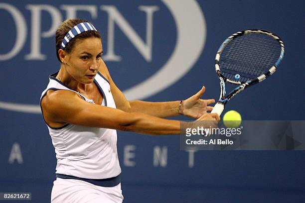 Severine Bremond of France returns to Serena Williams of the United States during Day 8 of the 2008 U.S. Open at the USTA Billie Jean King National...