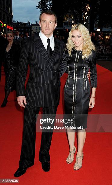 Guy Ritchie and Madonna arrive at the world film premiere of 'RocknRolla', at Odeon West End on September 1, 2008 in London, England.