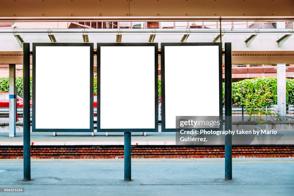 Blank billboards at train station