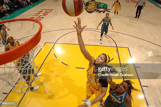 Candace Parker of the Los Angeles Sparks shoots against Candice Wiggins of the Minnesota Lynx at Staples Center on September 1, 2008 in Los Angeles,...