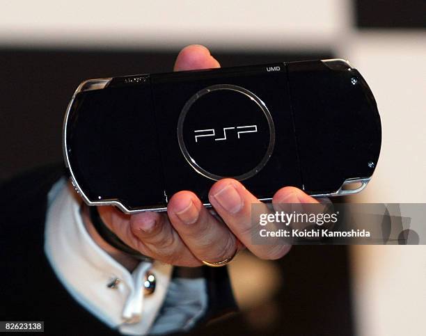 President of Sony Computer Entertainment Japan, Shawn Layden displays the new PlayStation Portable "PSP-3000" at Conrad Tokyo on September 2, 2008 in...