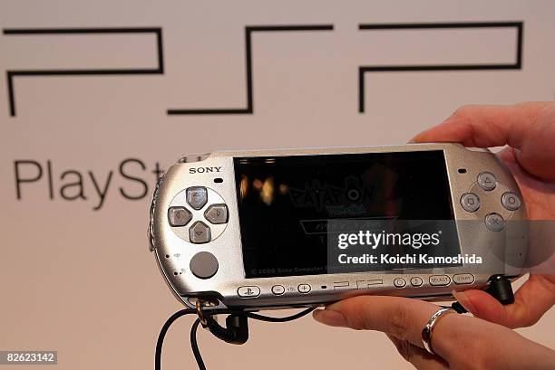 Model displays Sony Computer Entertainment Inc's "PlayStation Portable PSP-3000" at Conrad Tokyo on September 2, 2008 in Tokyo, Japan. The new PSP is...