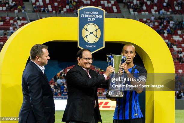 Internazionale Defender Joao Miranda receives the trophy after the International Champions Cup 2017 match between FC Internazionale and Chelsea FC on...