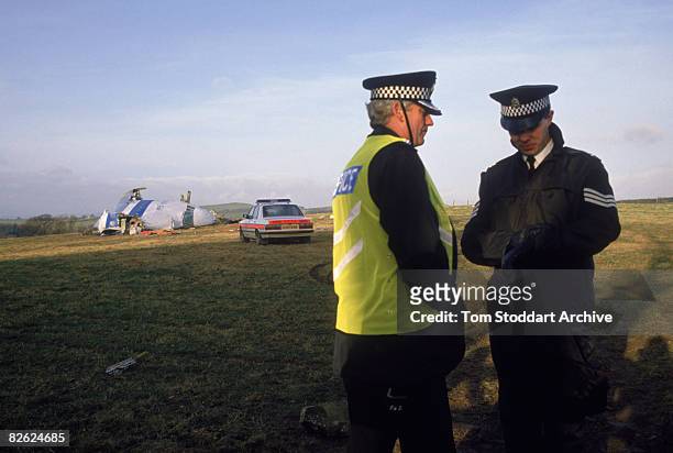 British police near some of the wreckage of Pan Am Flight 103 after it crashed onto the town of Lockerbie in Scotland, 22nd December 1988. On 21st...