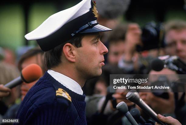 Prince Andrew, Duke of York talks to reporters in Lockerbie, Scotland during a visit to the Pan Am Flight 103 crash site, December 1988. The Boeing...