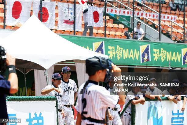 Japan team coach Toshihisa Nishi looks on in the top of the fifth inning during the WBSC U-12 Baseball World Cup Super Round match between Japan and...