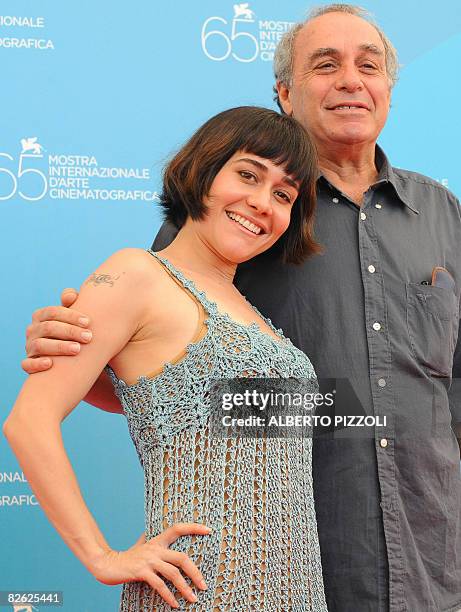 Brazil's director J?lio Bressane poses with Brazil's actress Alessandra Negrina during the photocall of the movie "A Erva do Rato" during the 65th...