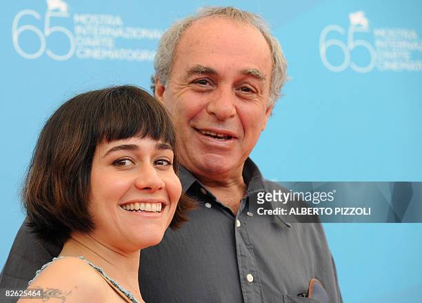 Brazil's director Julio Bressane poses with Brazil's actress Alessandra Negrina during the photocall of the movie "A Erva do Rato" during the 65th...