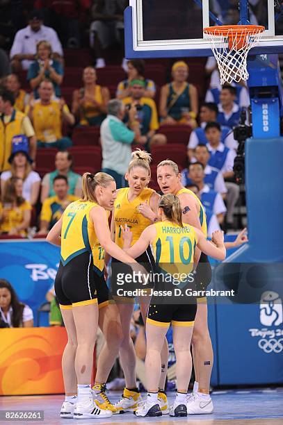Penny Taylor, Lauren Jackson, Kristi Harrower and Suzy Batkovic of the Australian National Team huddle during the Gold Medal game at the 2008 Beijing...