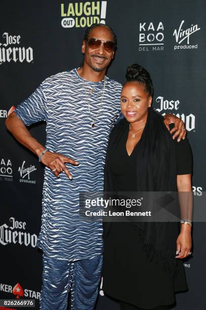 Snoop Dogg and Shante Taylor attends the Kevin Hart and Jon Feltheimer Host Launch Of Laugh Out Loud at Private Residence on August 3, 2017 in...