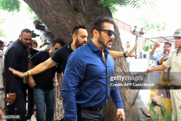 Indian Bollywood actor Salman Khan arrives to appear before a court district judge in connection with an Arms Act case in Jodhpur, on August 4, 2017....