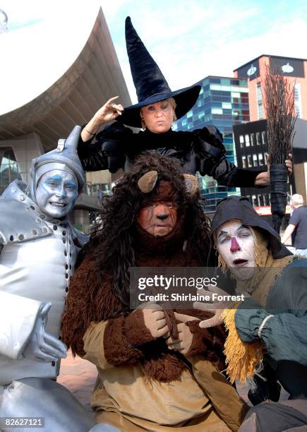 Lorna Luft in character as the Wicked Witch poses in costume with Tin Man Joe Standerline, Lion Jamie Greer and Scarecrow Ian Casey during a...