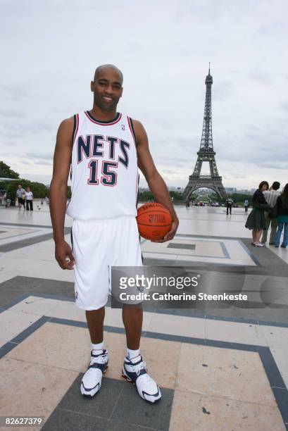 Vince Carter of the New Jersey Nets poses in front of the Eiffel Tower during a promotion for the 2008 NBA Europe Live Tour on September 2, 2008 in...