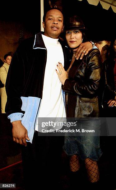 Dr. Dre and his wife Nicole Young attend the film premiere of "The Wash" November 12, 2001 in Los Angeles, CA.