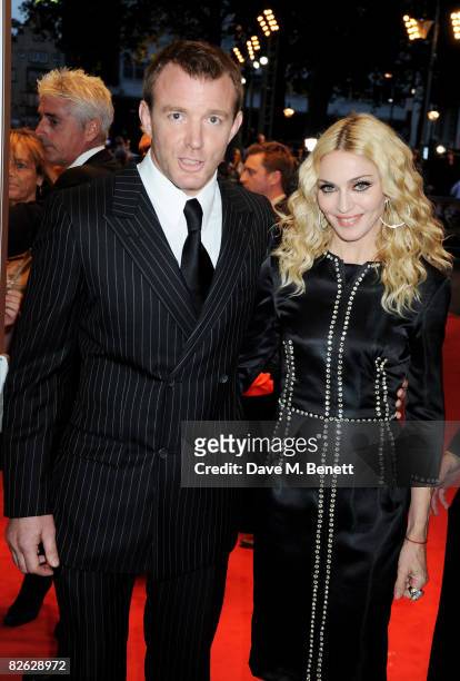 Guy Ritchie and Madonna arrive at the world film premiere of 'RocknRolla', at Odeon West End on September 1, 2008 in London, England.