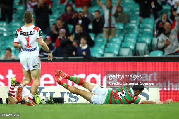 Bryson Goodwin of the Rabbitohs scores a try during the round 22 NRL match between the St George Illawarra Dragons and the South Sydney Rabbitohs at...