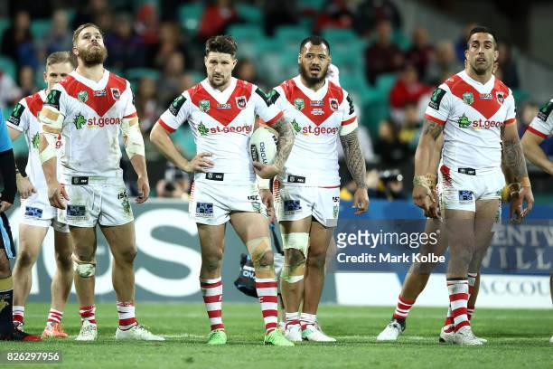 The Dragons look dejected after a a Rabbitohs try during the round 22 NRL match between the St George Illawarra Dragons and the South Sydney...