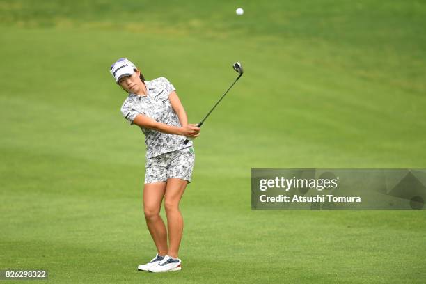 Narumi Yamada of Japan chips onto the 9th green during the first round of the meiji Cup 2017 at the Sapporo Kokusai Country Club Shimamatsu Course on...