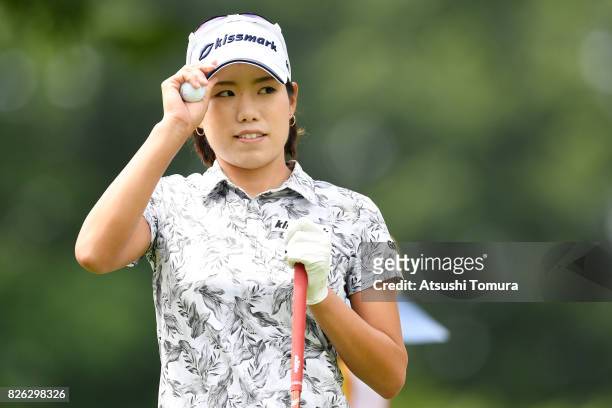Narumi Yamada of Japan reacts during the first round of the meiji Cup 2017 at the Sapporo Kokusai Country Club Shimamatsu Course on August 4, 2017 in...