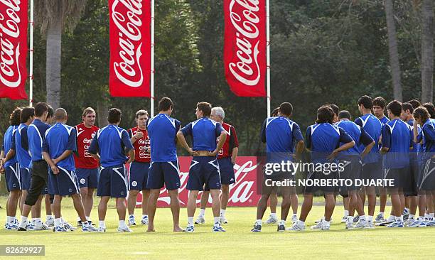 Argentine coach of the Paraguayan national football team, Gerardo "Tata" Martino , gives instructions to his players during a training session in...