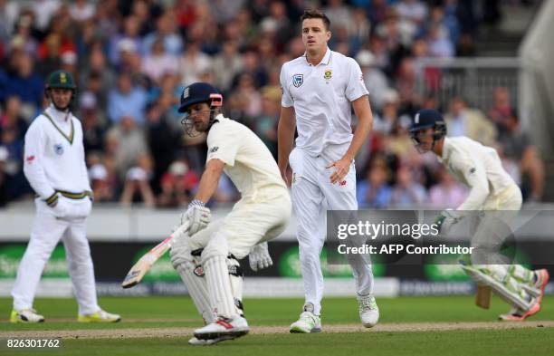 South Africa's Morne Morkel watches as England's Alastair Cook and England's Keaton Jennings add runs on the first day of the fourth test at Old...