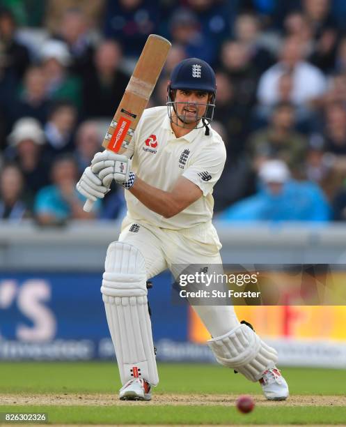 England batsman Alastair Cook drives during day one of the 4th Investec Test match between England and South Africa at Old Trafford on August 4, 2017...